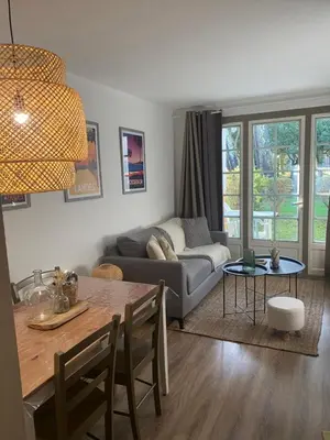 Coin salon dans l'établissement Appartement du Golf Les Bastides piscine et océan