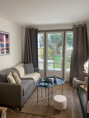 Coin salon dans l'établissement Appartement du Golf Les Bastides piscine et océan