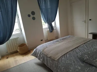 Un ou plusieurs lits dans un hébergement de l'établissement Villa Eva des landes