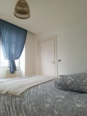 Un ou plusieurs lits dans un hébergement de l'établissement Villa Eva des landes