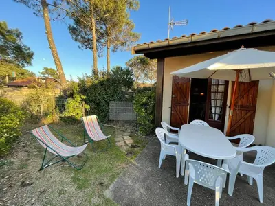 Jardin de l'établissement Maison cosy 5 pers proche plage avec jardin, animaux admis - FR-1-413-120