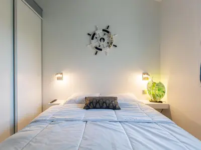 Un ou plusieurs lits dans un hébergement de l'établissement Holiday Home Paradise Océan-13 by Interhome
