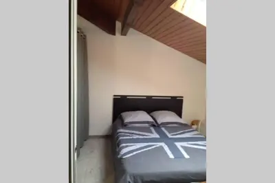 Un ou plusieurs lits dans un hébergement de l'établissement Appartement tout confort proche plage