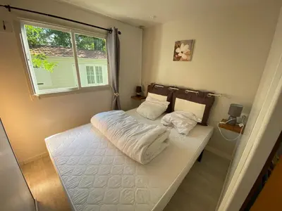 Un ou plusieurs lits dans un hébergement de l'établissement Mobile Home Zen pour 4 à 6 pers camping 4* Saint Paul Les Dax