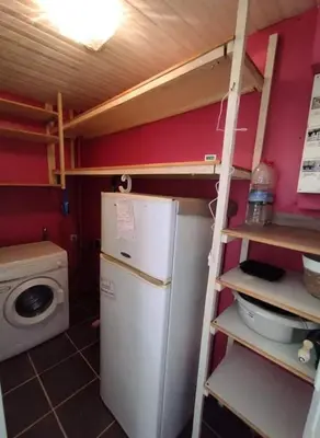 Cuisine ou kitchenette dans l'établissement Maison Landaise chaleureuse