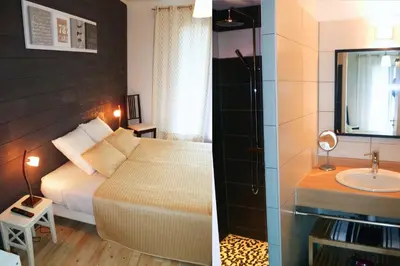 Un ou plusieurs lits dans un hébergement de l'établissement Ohana Lodge