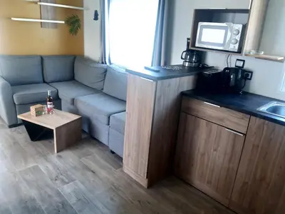 Cuisine ou kitchenette dans l'établissement Mobilhome Contis aux Camping des Dunes