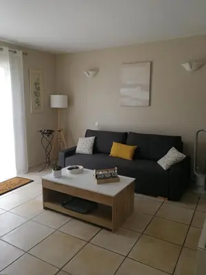 Coin salon dans l'établissement Au Doux Repos