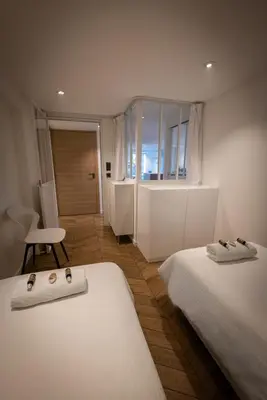 Un ou plusieurs lits dans un hébergement de l'établissement APPARTEMENTS LOFT OCEAN - Tarnos