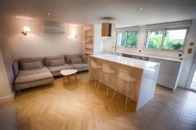 Coin salon dans l'établissement APPARTEMENTS LOFT OCEAN - Tarnos