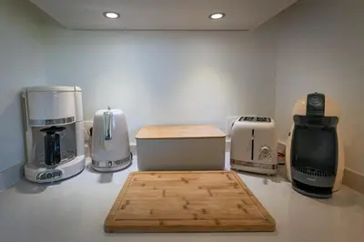 Cuisine ou kitchenette dans l'établissement APPARTEMENTS LOFT OCEAN - Tarnos