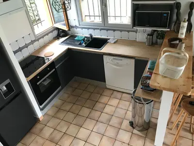 Cuisine ou kitchenette dans l'établissement Maison familiale