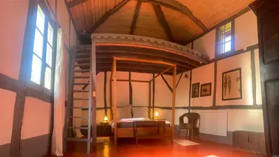 Un ou plusieurs lits dans un hébergement de l'établissement Maison Magnolia