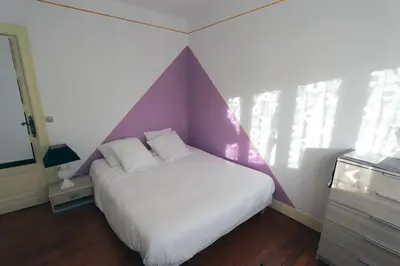 Un ou plusieurs lits dans un hébergement de l'établissement APPARTEMENT 1 à 9 personnes Hagetmau coeur de ville