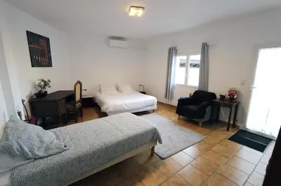 Un ou plusieurs lits dans un hébergement de l'établissement APPARTEMENT 1 à 9 personnes Hagetmau coeur de ville