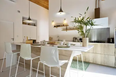 Cuisine ou kitchenette dans l'établissement La Maison Boisée - Welkeys