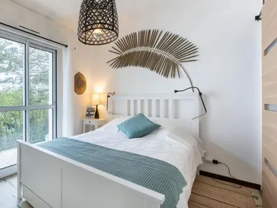Un ou plusieurs lits dans un hébergement de l'établissement Apartment Marines-3 by Interhome