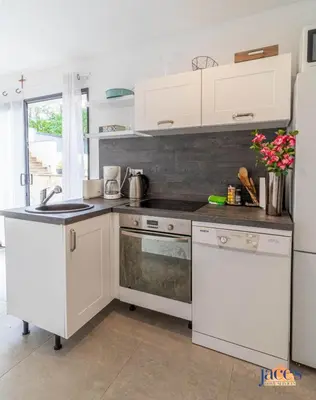 Cuisine ou kitchenette dans l'établissement Villa Paradis Pyla sur Mer
