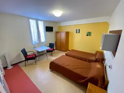 Télévision ou salle de divertissement dans l'établissement Studios LOC AG2