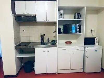 Cuisine ou kitchenette dans l'établissement Studios LOC AG2