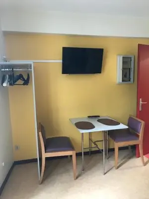 Télévision ou salle de divertissement dans l'établissement Studios LOC AG2