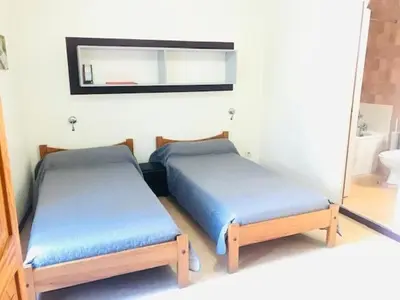 Un ou plusieurs lits dans un hébergement de l'établissement Studios LOC AG2