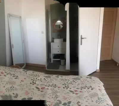 Un ou plusieurs lits dans un hébergement de l'établissement Chambres d’hôtes Arremounon