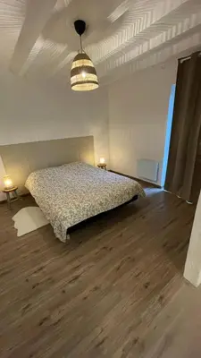 Un ou plusieurs lits dans un hébergement de l'établissement Chambres d’hôtes Arremounon