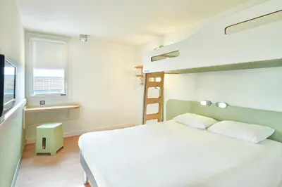 Un ou plusieurs lits dans un hébergement de l'établissement ibis budget Saint Paul Les Dax