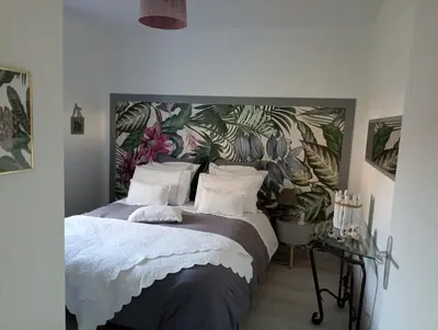 Un ou plusieurs lits dans un hébergement de l'établissement Maison neuve et chaleureuse