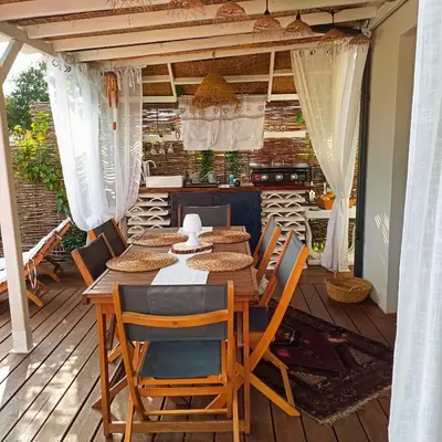 Coin salon dans l'établissement Maison neuve et chaleureuse