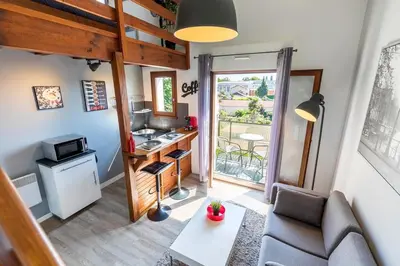 Coin salon dans l'établissement DUPLEX DESIGN TERRASSE - Parking