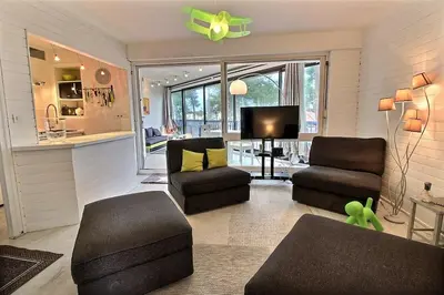 Télévision ou salle de divertissement dans l'établissement Cocoon