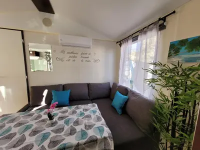 Un ou plusieurs lits dans un hébergement de l'établissement Mobil Home Plage Lac Parentis/Biscarosse