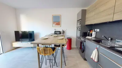 Cuisine ou kitchenette dans l'établissement TERRASSES SAINT GEORGES - Un emplacement exceptionnel au centre-ville et au calme à quelques pas du lac marin