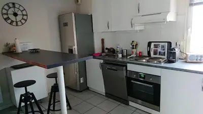 Cuisine ou kitchenette dans l'établissement Appartement cosy à Dax avec piscine partagée - 65 m².