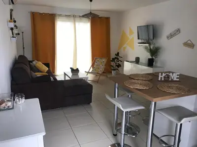 Coin salon dans l'établissement A 1km de la plage - Le Pin -