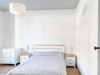 Un ou plusieurs lits dans un hébergement de l'établissement Maison Individuelle T4 pour 5 pers, Proche Centre et Océan, Grand Jardin, Non Fumeur, Pas d'animaux - FR-1-521-190