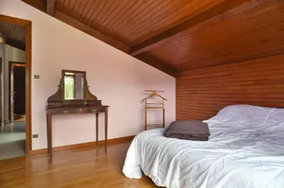 Un ou plusieurs lits dans un hébergement de l'établissement Villa avec piscine et jardin, Gujan-Mestras