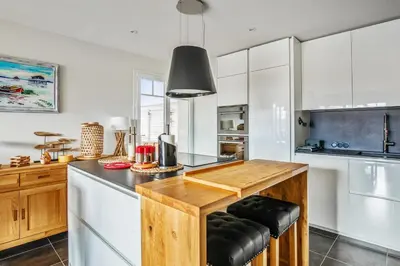 Cuisine ou kitchenette dans l'établissement Appartement des Asphodèles - Welkeys