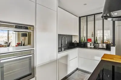 Cuisine ou kitchenette dans l'établissement Appartement des Asphodèles - Welkeys