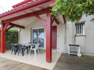 Balcon ou terrasse dans l'établissement Maisonnette 2 étoiles à Mimizan Plage à 200m de l'océan, 6 pers, terrasse, parking, tout confort - FR-1-50-75