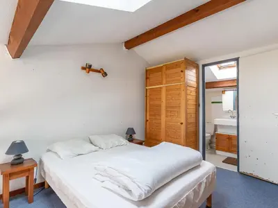Un ou plusieurs lits dans un hébergement de l'établissement Appartement avec vue sur l'océan, balcon, et tout confort, à Mimizan pour 6 personnes - FR-1-50-79