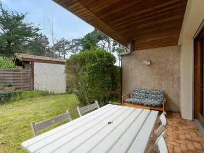 Coin salon dans l'établissement Maison 6 pers. à Mimizan, bord de courant, forêt et océan, 3 étoiles, tout confort, ménage inclus - FR-1-50-80