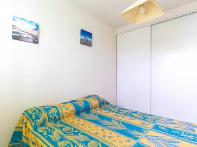 Un ou plusieurs lits dans un hébergement de l'établissement Appartement 2 étoiles à Mimizan Plage pour 4 personnes avec parking - FR-1-50-85