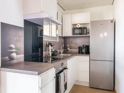 Cuisine ou kitchenette dans l'établissement Duplex centre station Biscarrosse 6 pers, terrasse, WIFI, parking, équipements complets - FR-1-521-193