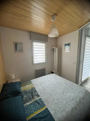 Un ou plusieurs lits dans un hébergement de l'établissement Appartement HOSSEGOR plage SUD Classé 3 étoiles