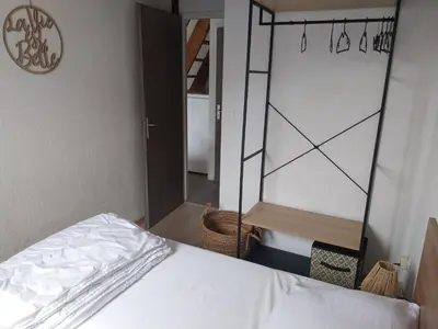 Un ou plusieurs lits dans un hébergement de l'établissement Biscarrosse-plage jolie maisonnette avec terrasse privative - 200m de la plage
