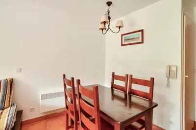 Coin salon dans l'établissement Le Domaine du Golf de Pinsolle - maeva Home - Appartement 2 pièces 5 personnes - Confort MAE-7414