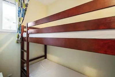 Un ou plusieurs lits dans un hébergement de l'établissement Le Domaine du Golf de Pinsolle - maeva Home - Appartement 2 pièces 6 personnes - Confort MAE-9354